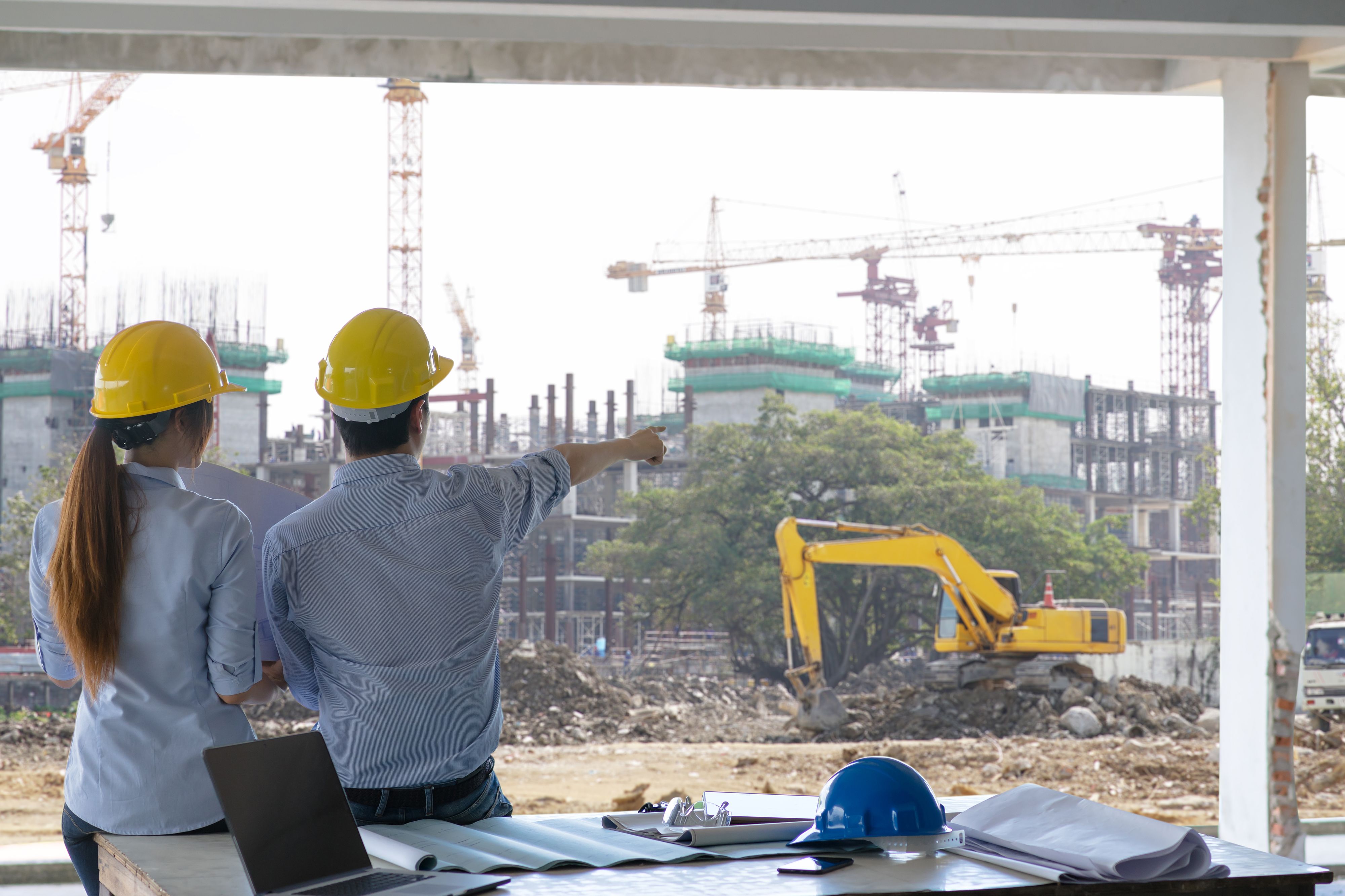 engineer-group-worker-meeting-discussion-with-construction-blueprint-site-work-point-finger-work-site.jpg