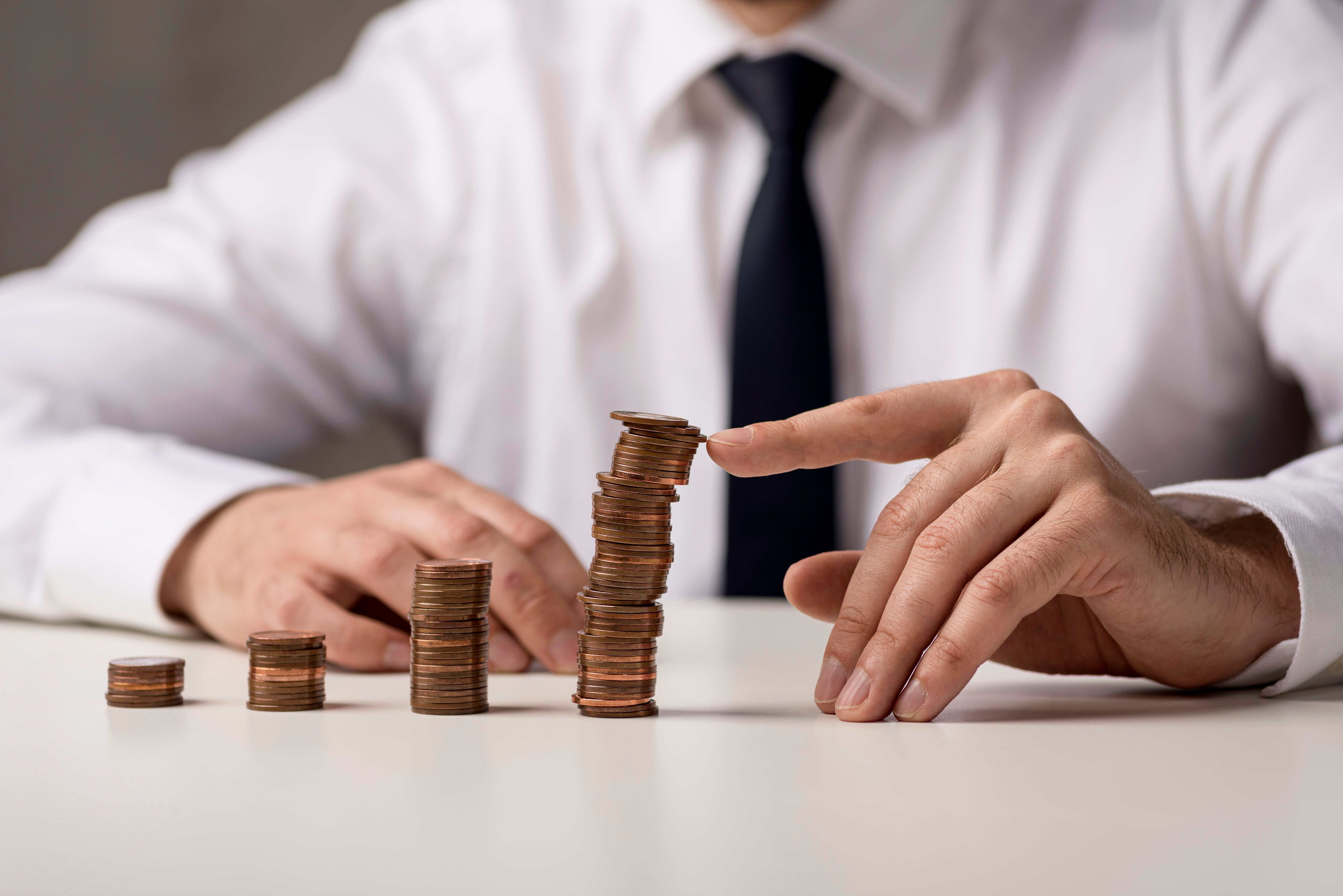 front-view-businessman-suit-tie-with-coins.jpg